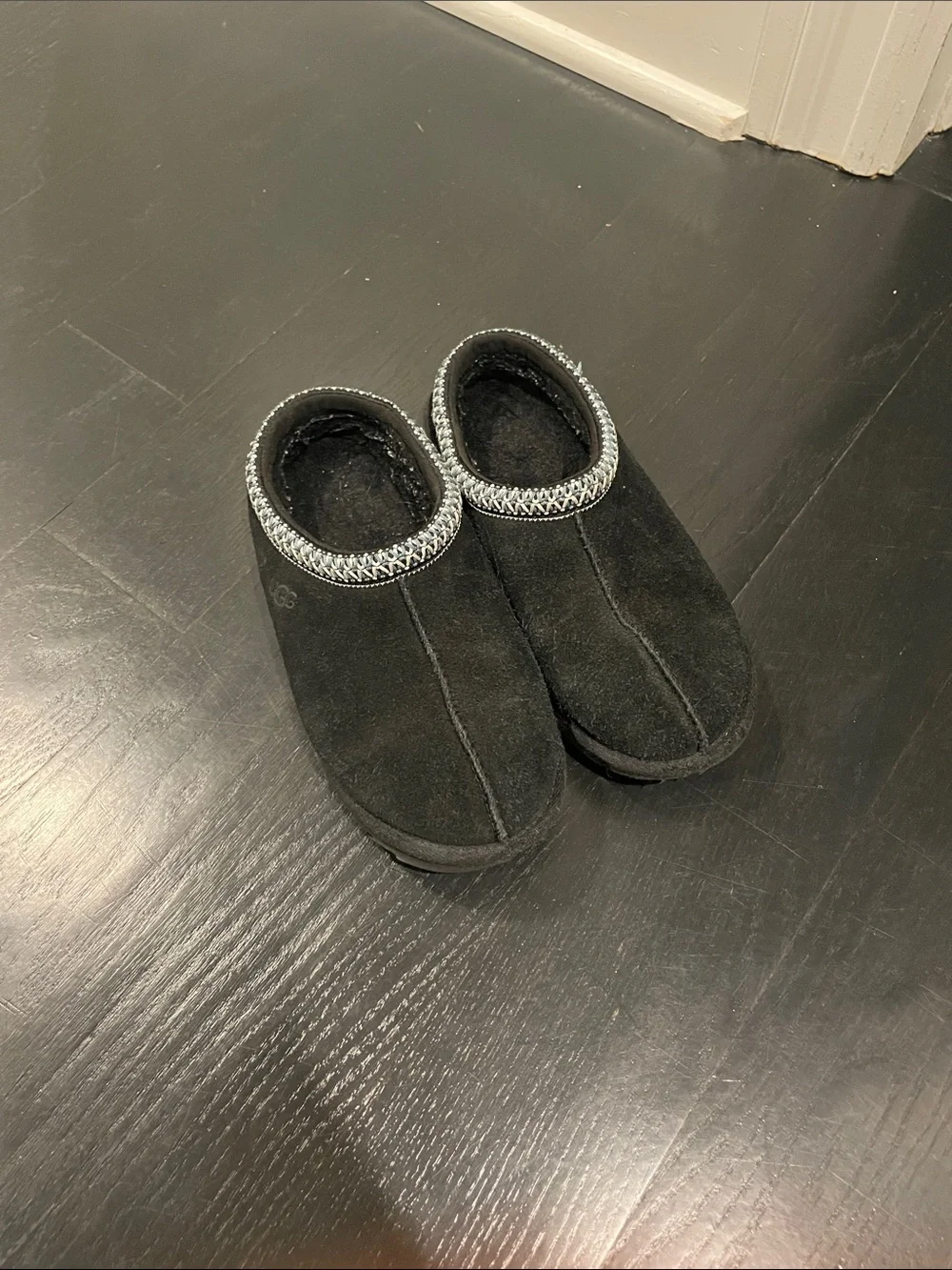 UGG Kids Black Suede Slip-On Slippers with Silver Trim